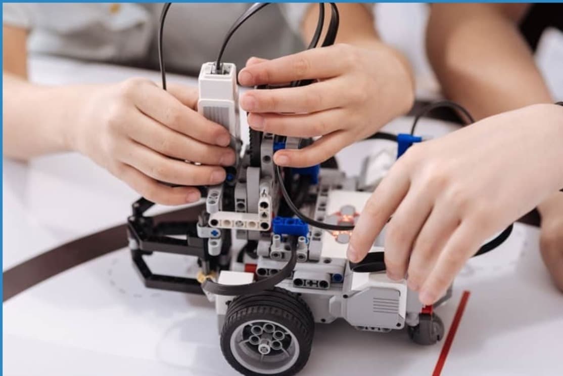 Diverse group of students working on a robotics project